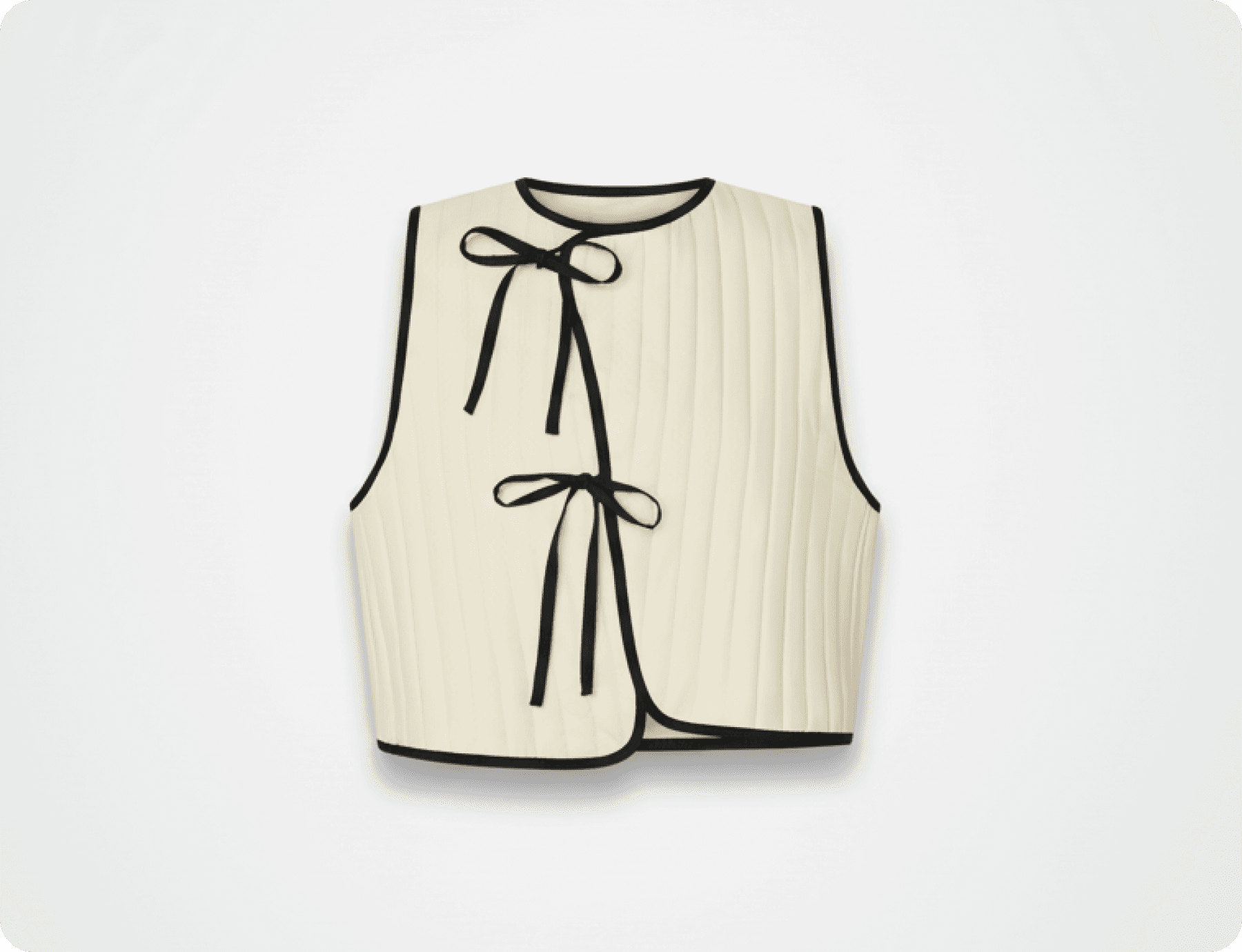 White vest with black bow fashion item